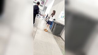 制服を着た女子生徒が買い物中にスマホに夢中になっている。短いスカートとピンクの下着がとても可愛らしい ipcam 2